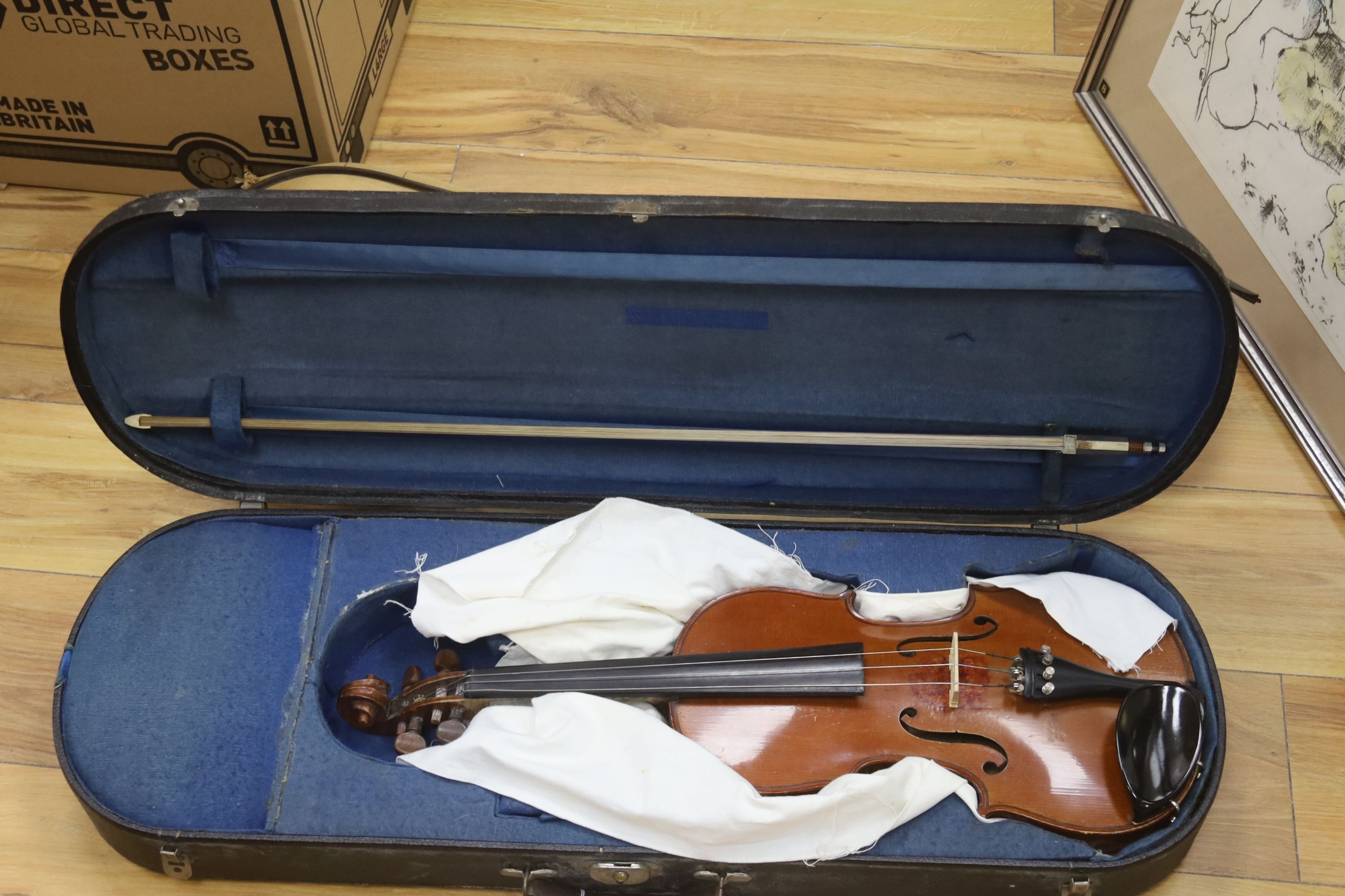 An early 20th century French vioilin, cased with bow and a cased saxon violin